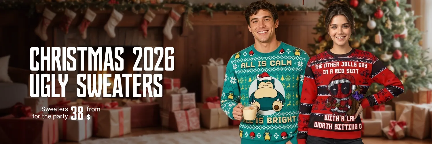 Couple wearing anime ugly Christmas sweaters by a decorated tree